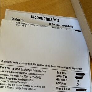 New in box UGG black mini boots size 6 1116109